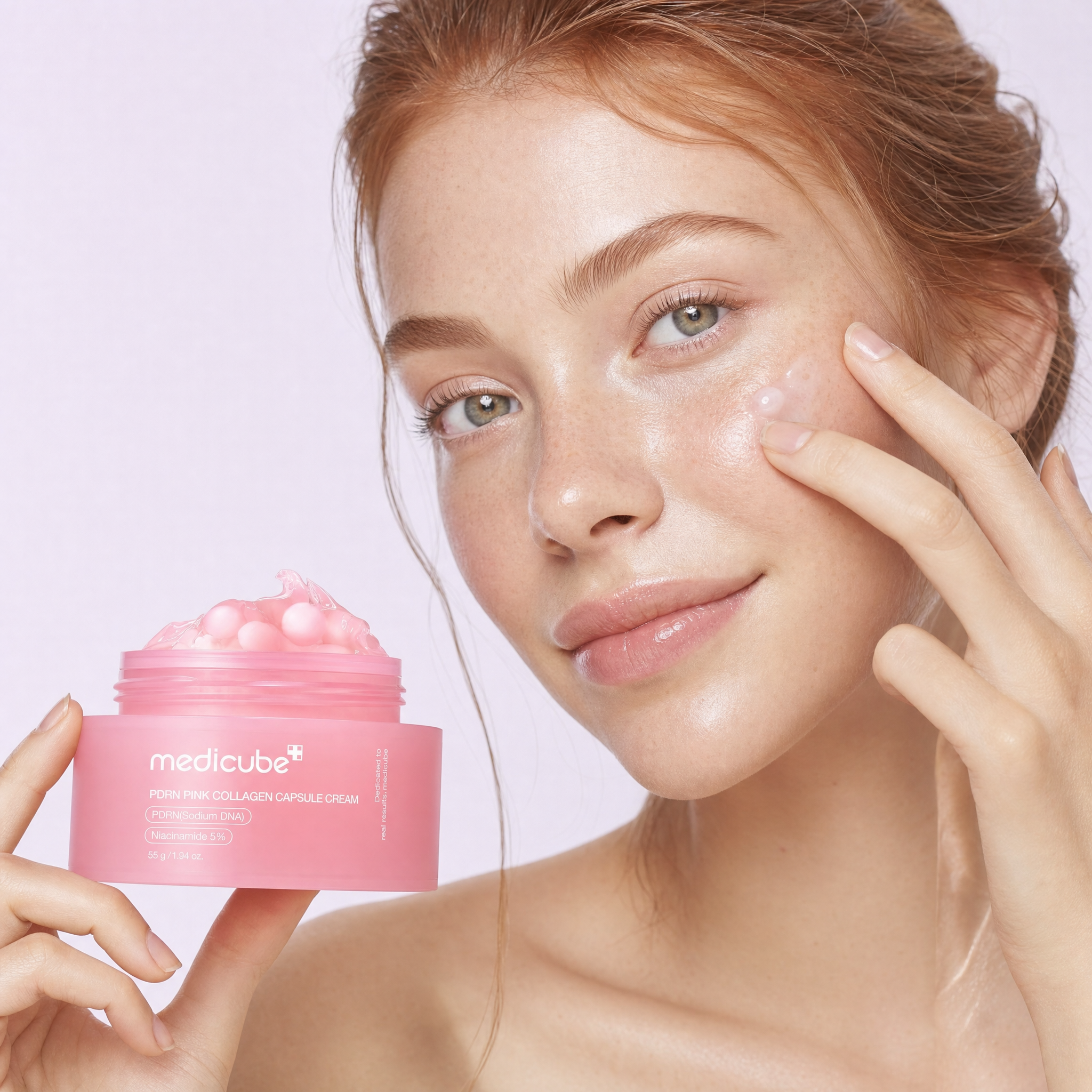 Model holding Medicube PDRN Pink Collagen Capsule Cream
